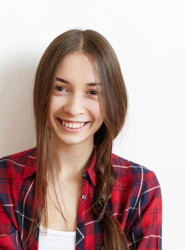 portrait-of-attractive-and-happy-young-woman-with-KLS4CFW.jpg